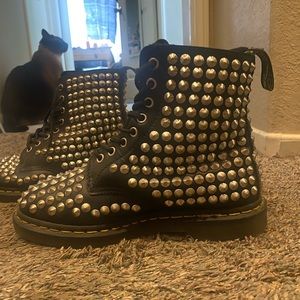 Studded doc martens.